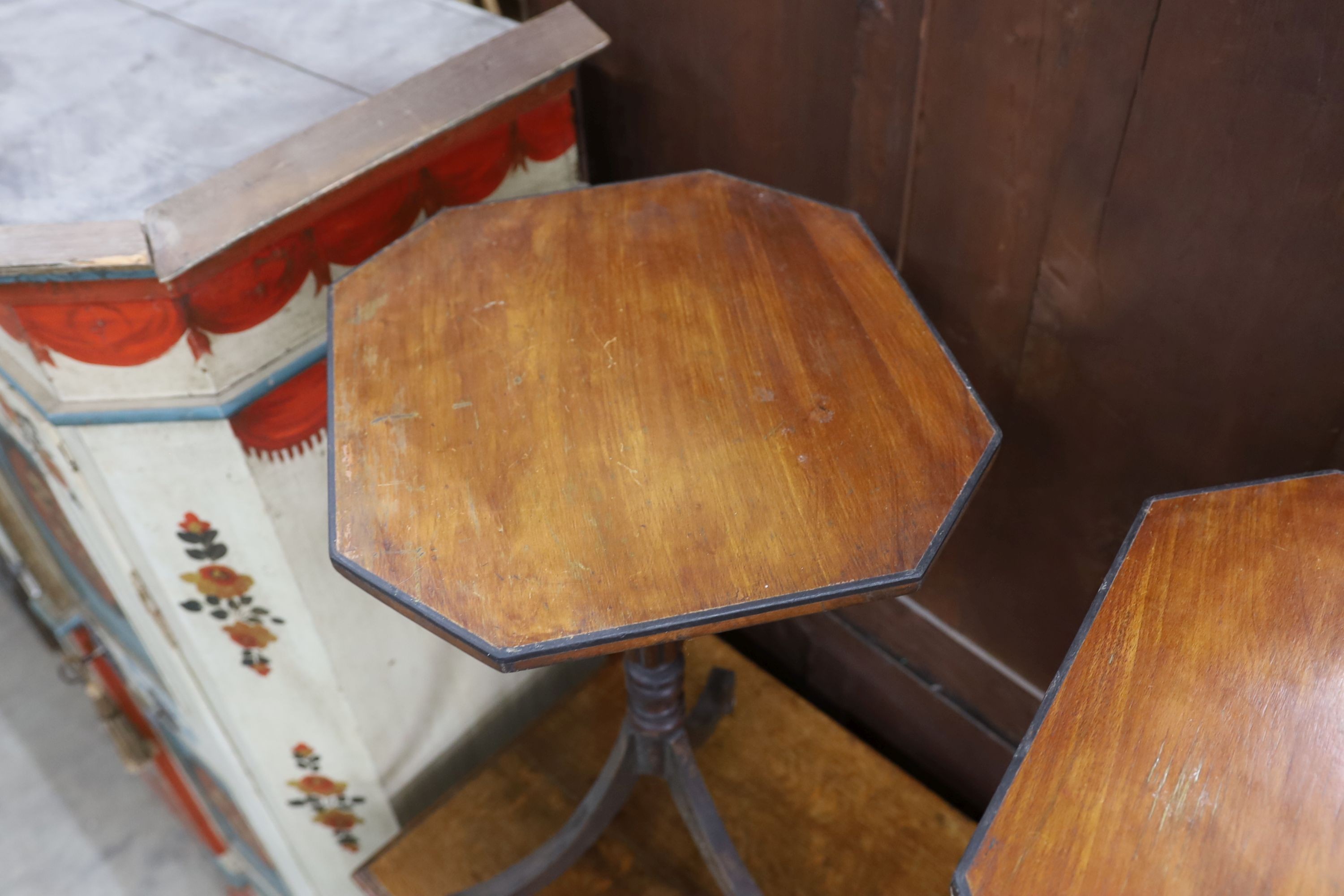 A pair of Regency style octagonal tripod wine tables, width 44cm, depth 39cm, height 73cm